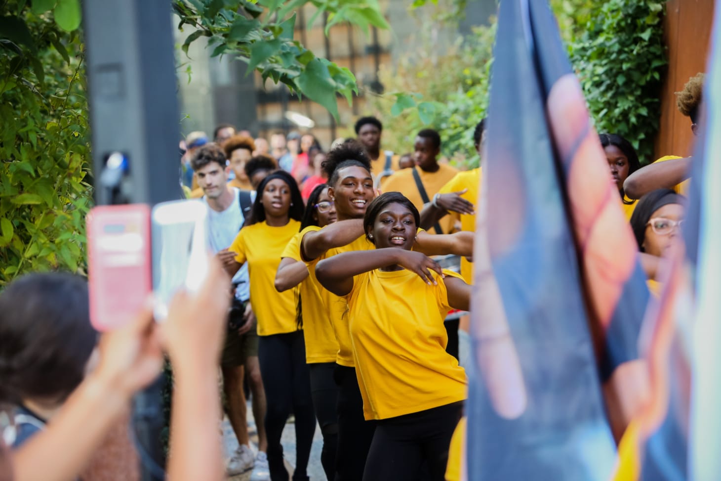 A group of young Black steppers performs on the high line. 