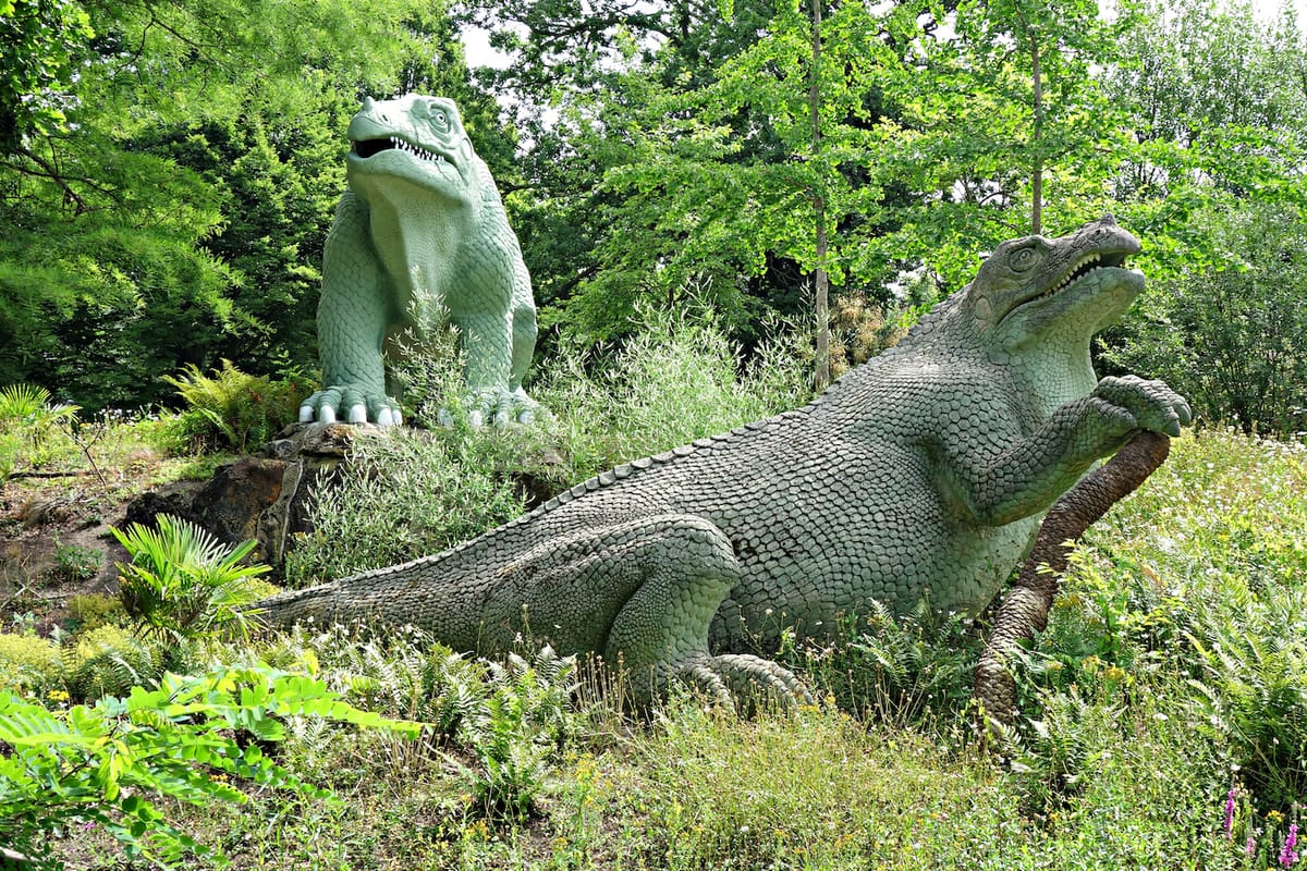 Dinosaur sculptures in Crystal Palace Park, London (photo by the author for Hyperallergic)