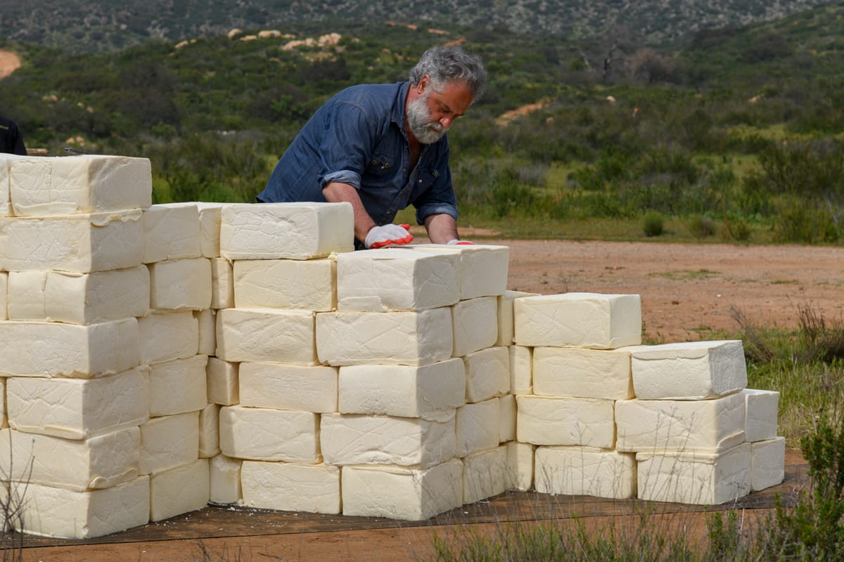 Artist Sues Trump’s Border Wall Contractors for Destroying His “Cheese Wall”