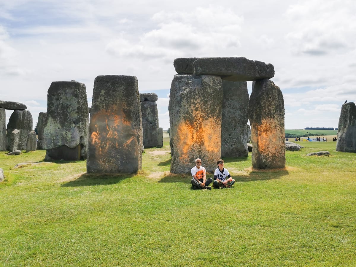 Climate Protesters Douse Stonehenge in Orange Powder