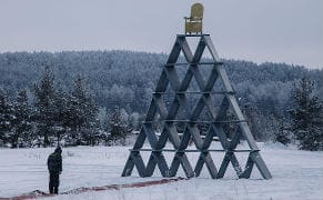 Street Artist Creates a House of Cards from Riot Shields