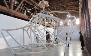 A Colossal Inflatable Robot Opens Its Arms Into a Portal