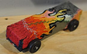 Gallery Hosts Miniature Gravity Car Race Featuring 100s of Artist-Designed Chariots