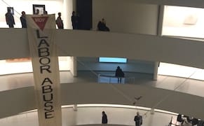Protesters Unfurl Three-Story Banner in Guggenheim Museum