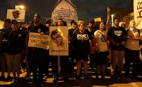 Hundreds Take to the Streets to Seek Justice for Artist Killed by Miami Police