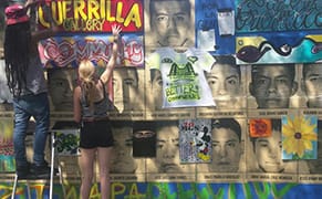 A Construction Wall in Harlem Becomes a Guerrilla Street Art Gallery