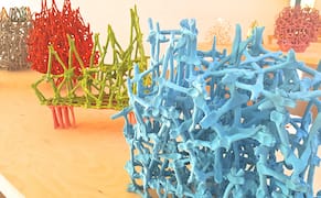 Visions of Detroit’s Past and Future in Clay and Cardboard