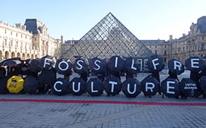 Artists and Activists Sing, Spill “Oil” in Anti–Fossil Fuel Protests at the Louvre
