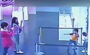 Kids Smash Art at Glass Museum While Adults Stand by Filming