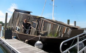 A Houseboat for Artistic Eco-experimentation Docks Among Yachts