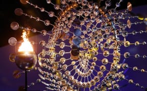 The Wind-Powered Kinetic Sculpture Pulsing Behind the Olympic Cauldron