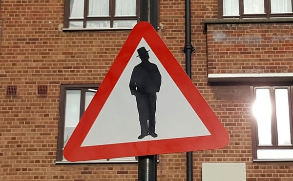 Artist Traffics in Road Signs that Land Him in a Jam
