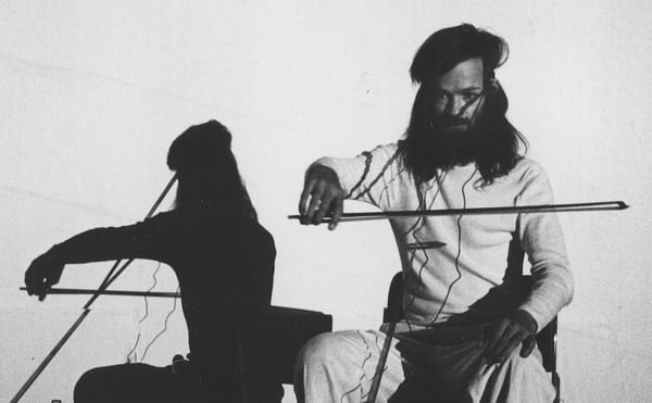 Tony Conrad performance of “Bowed Film” (1976) (photo by Linda Edelstein)