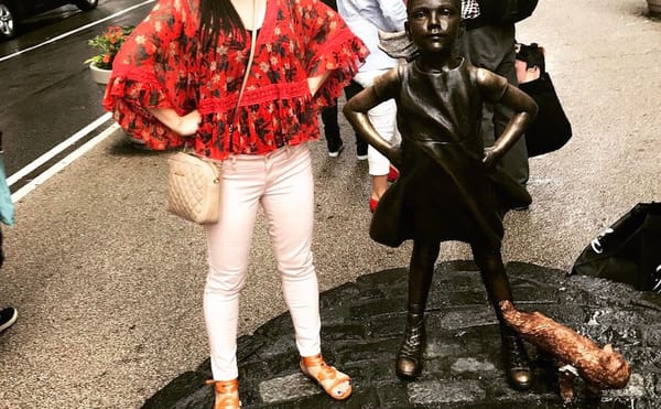 Artist Places “Pissing Pug” Sculpture at the Feet of “Fearless Girl”