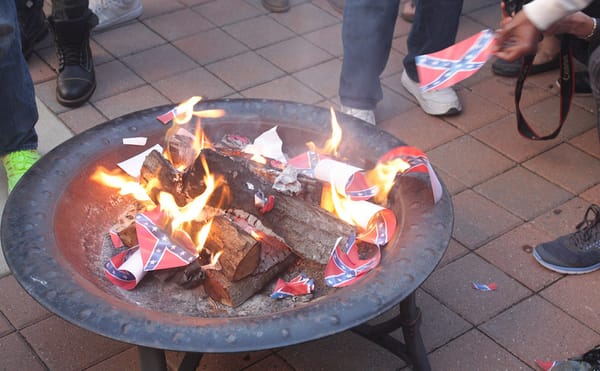 On Memorial Day, an Artist Burns and Buries a Confederate Flag