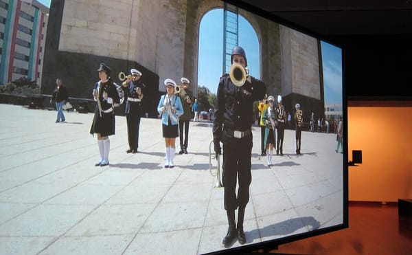 Wielding Instruments Like Weapons, a Marching Band Sweeps Through Mexico City