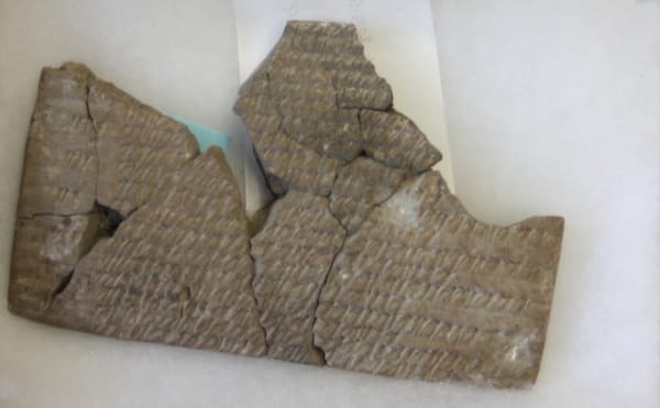 A tablet from the Persepolis Collection on Matthew Stopler's desk at the Oriental Institute at the University of Chicago