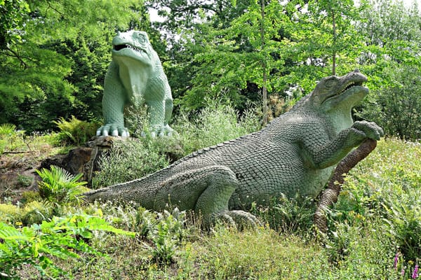 Dinosaur sculptures in Crystal Palace Park, London (photo by the author for Hyperallergic)