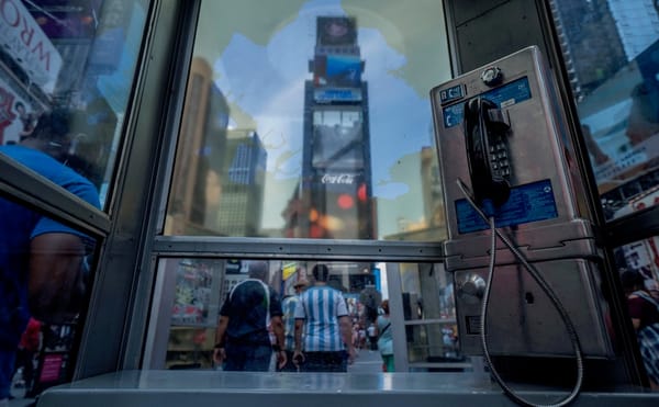 Times Square Phone Booths Call Up Immigrants' Stories