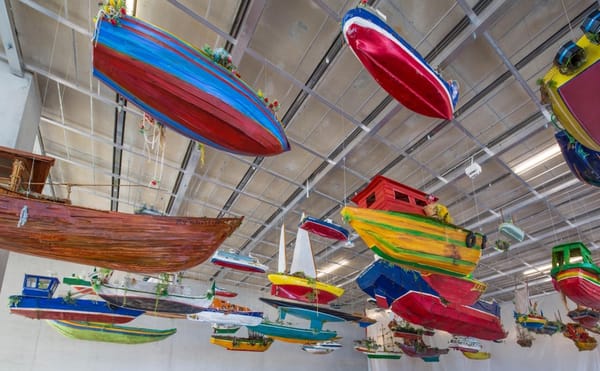 A Sea of Suspended Boats Evokes the Migrant’s Perilous Journey