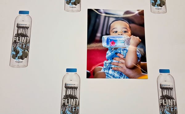 Pope.L’s Conceptual Bottled Water Project Calls Attention to the Crisis in Flint