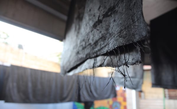 Oscar Murillo Hangs Black Flags in Palestinian East Jerusalem