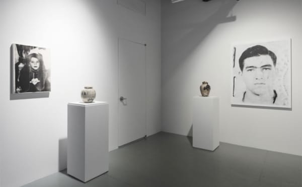 A Family Portrait in Ash