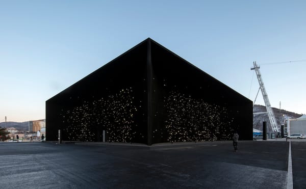 An Olympic Pavilion Black as Outer Space Lands in Pyeongchang