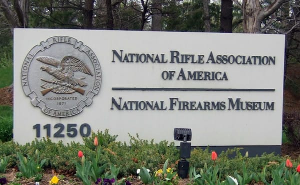 The sign for the National Rifle Association headquarters and National Firearm Museum in Fairfax, Virginia (photo by Joe Loong