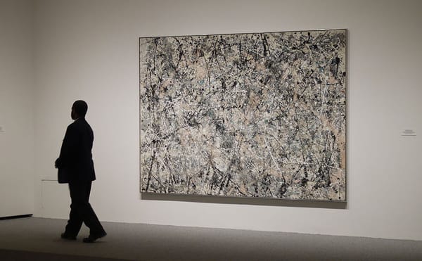 A guard and a Jackson Pollock painting at the National Gallery of Art in Washington, DC (photo by Detlef Schobert/Flickr)