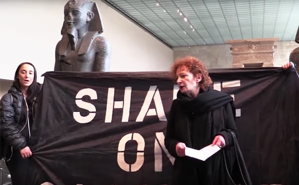 Nan Goldin at Saturday's PAIN Sackler protest in the Metropolitan Museum's Sackler Wing (screenshot by the author via YouTube