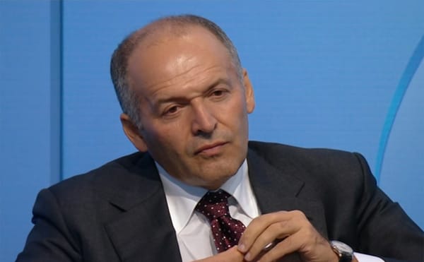 Victor Pinchuk listening to a speech by Donald Trump at the 2015 Yalta European Strategy conference in Kiev (screenshot by th