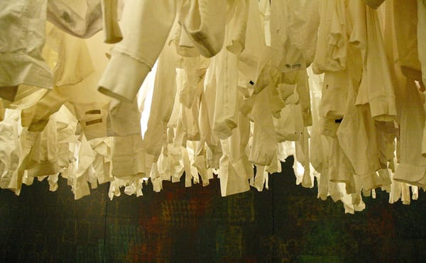 Installation view of Rachel Breen and Alison Morse's project The Price of Our Clothes at the Perlman Teaching Museum (photo b