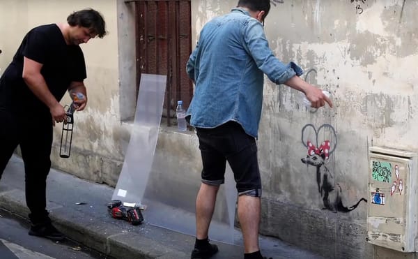 Banksy Confirms He’s in Paris as New Murals Are Vandalized and Protected