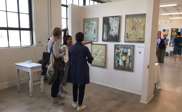 Artist Taeko Kuraya speaks to visitors in her studio (all images courtesy Trestle)