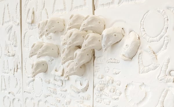 A Meditation on Identity through Chickenheads and Chains