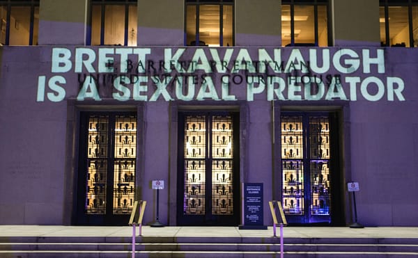 Artist Projects "Brett Kavanaugh Is a Sexual Predator" Onto DC Courthouse