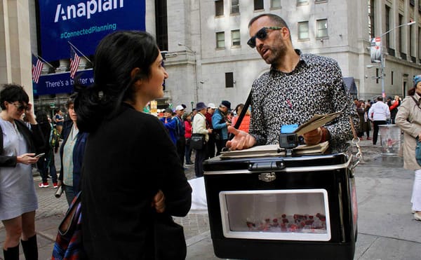 Artist Critiques Capitalism and War, Sells Vials of His Blood on Wall Street