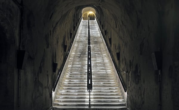 A Drunk, Dark, and Gritty Show in a French Wine Cellar