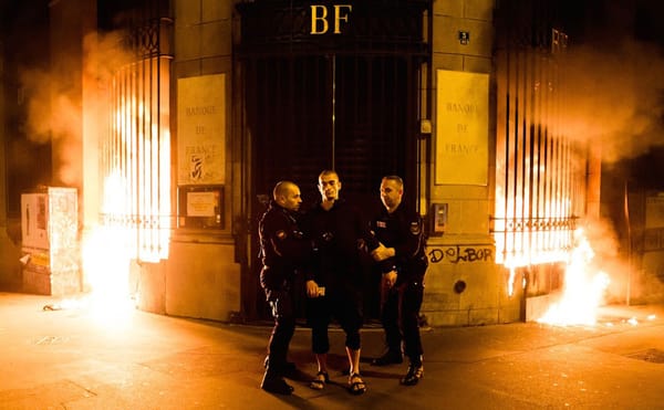 Russian Artists Convicted in French Court for Setting Fire to Bank of France in Performance
