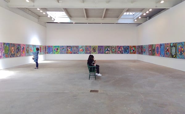 A Young Painter Burlesques the Role of Outsider Artist