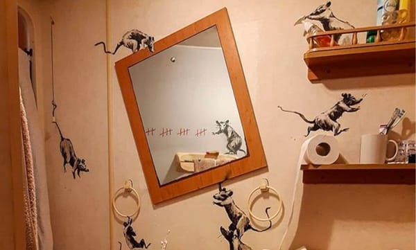 How Is Banksy Spending Quarantine? By Turning His Bathroom Into a Work of Art