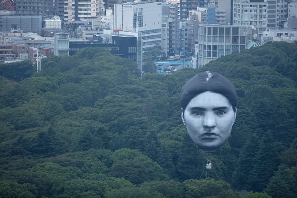 Giant Balloon Face Floats Over Tokyo