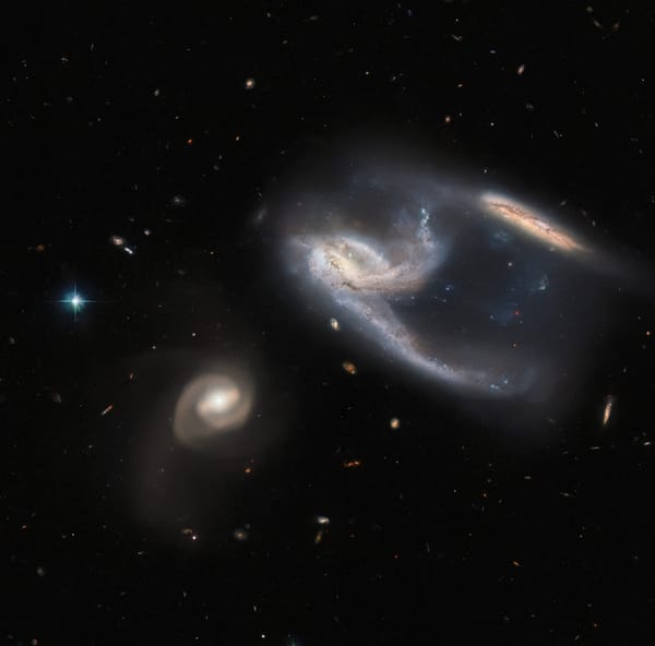 NASA Unveils Awe-inspiring Image of Galaxy Threesome Gone Wrong