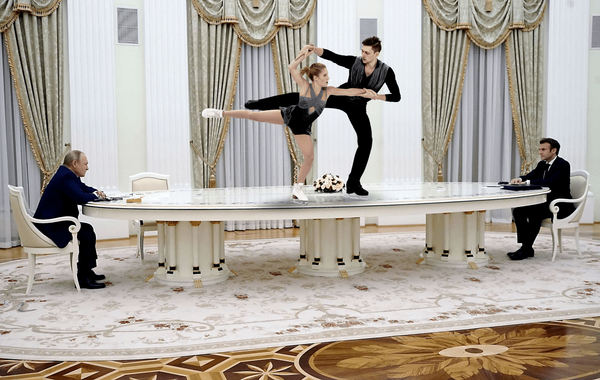 The Most Hilarious Memes About Putin and Macron's Bizarre Kremlin Meeting