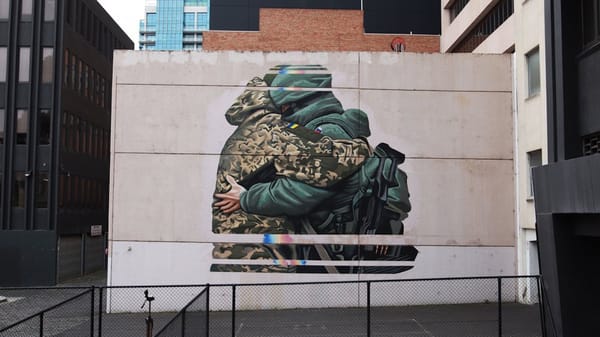 Mural of Ukrainian and Russian Soldiers Hugging Draws Outcry