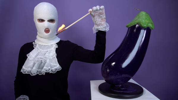 Burn Down the Patriarchy With this Eggplant Emoji Candle