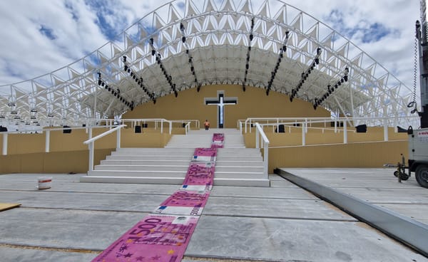 Artist Rolls Out Guerrilla “Red Carpet” to Protest Pope’s Lisbon Visit