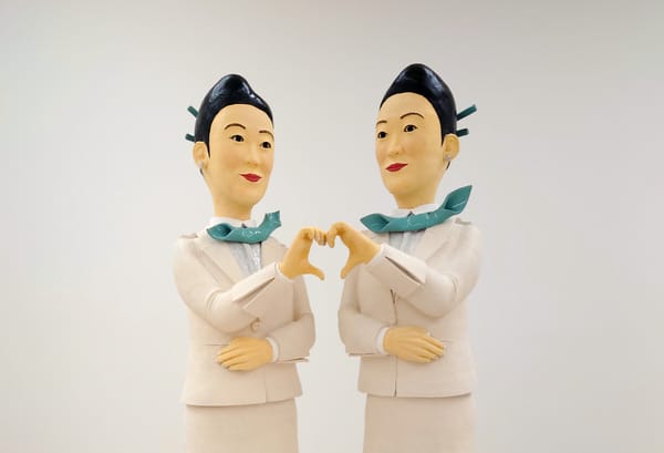 Behind a Flight Attendant’s Painted-On Smile