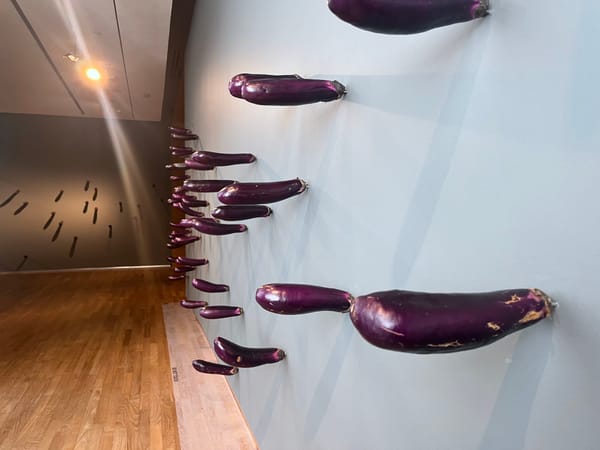 Visitors Can't Keep Their Hands Off This Eggplant Artwork